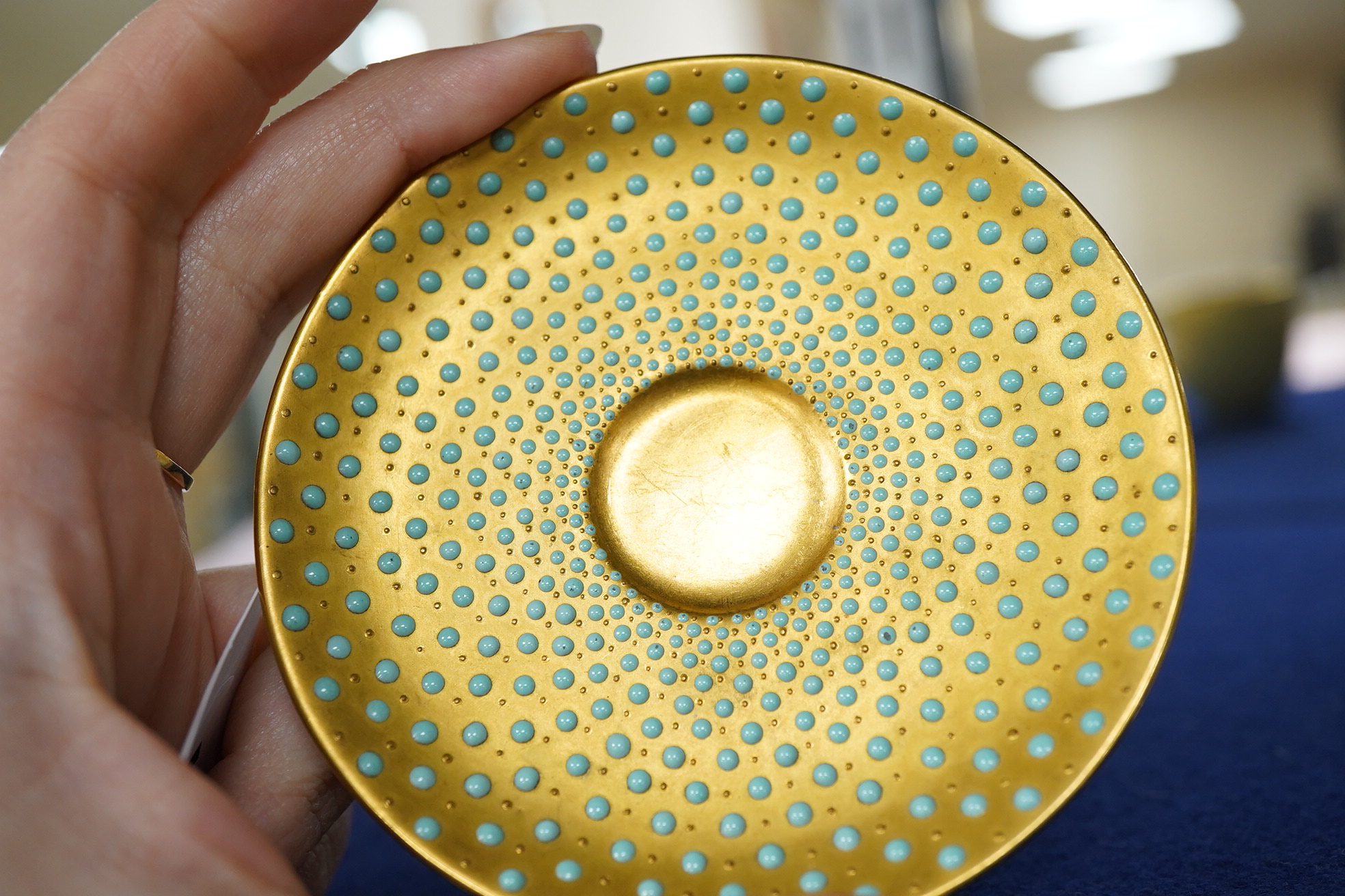 An early 20th century Coalport jewelled cabinet cup and saucer, a Karl Ens grop and a Plane figure